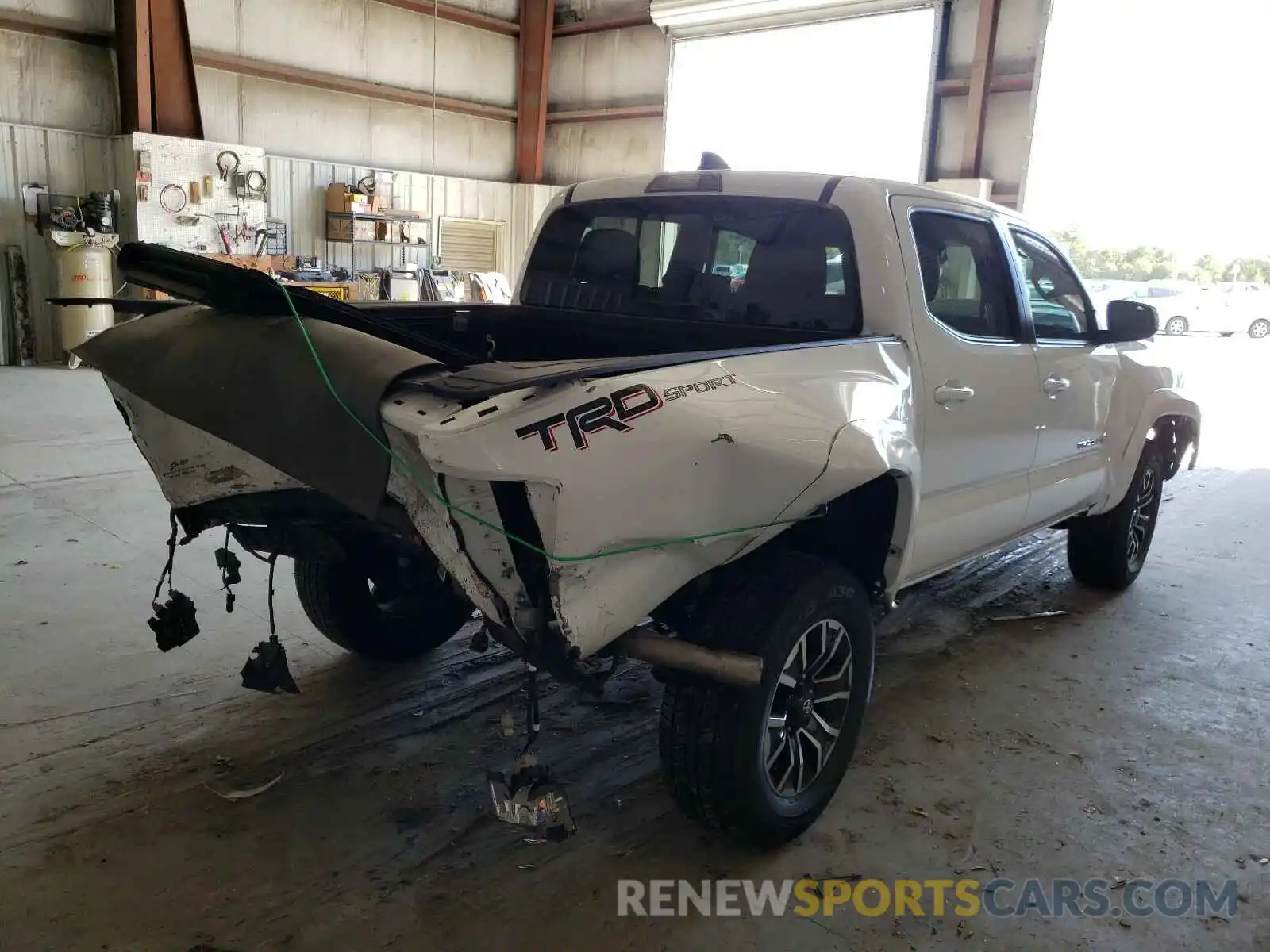 4 Photograph of a damaged car 3TMAZ5CN3LM119533 TOYOTA TACOMA 2020