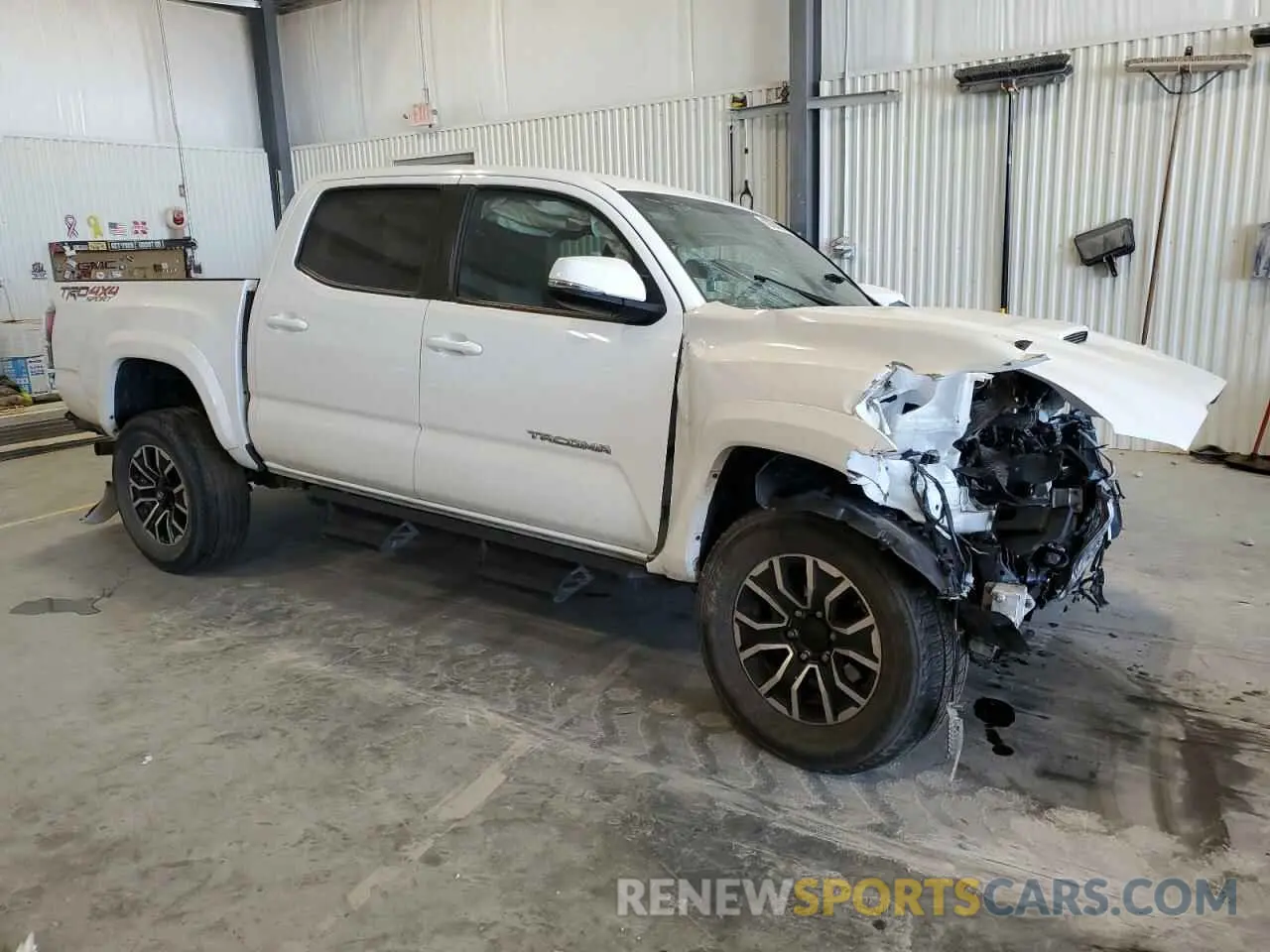 4 Photograph of a damaged car 3TMCZ5AN0LM312170 TOYOTA TACOMA 2020