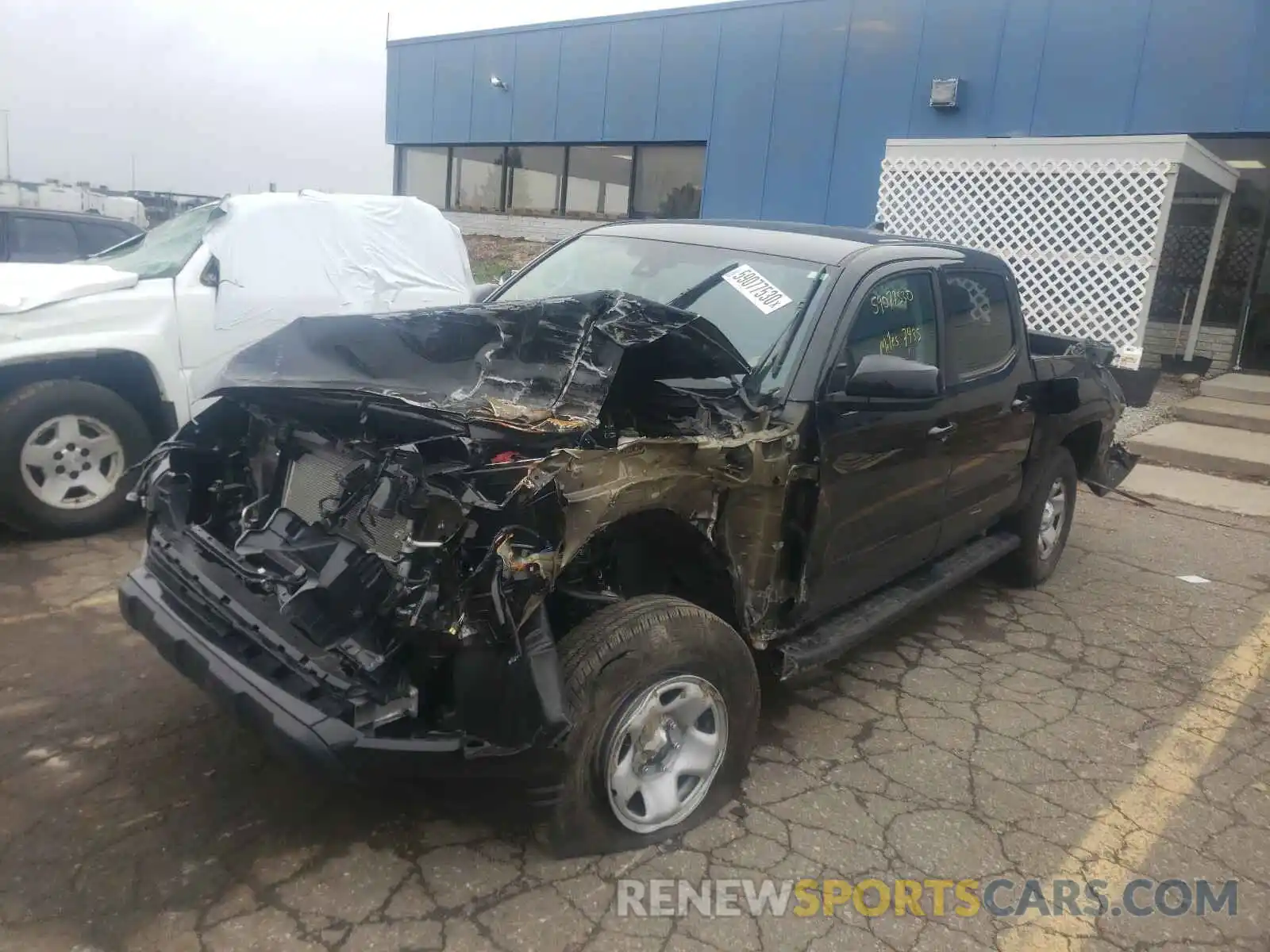 2 Photograph of a damaged car 3TMCZ5AN1LM338728 TOYOTA TACOMA 2020