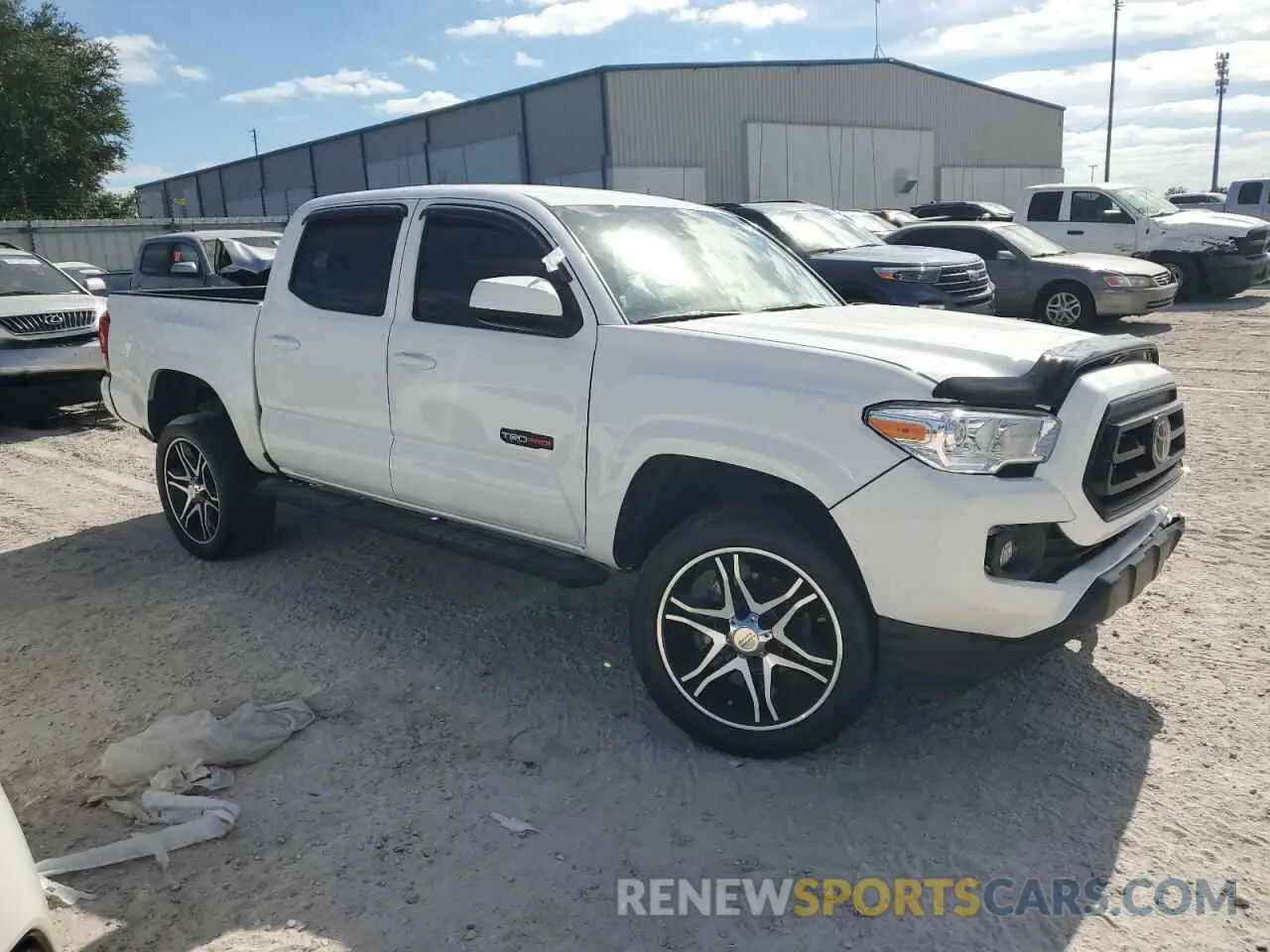 4 Photograph of a damaged car 3TMCZ5AN2LM340102 TOYOTA TACOMA 2020