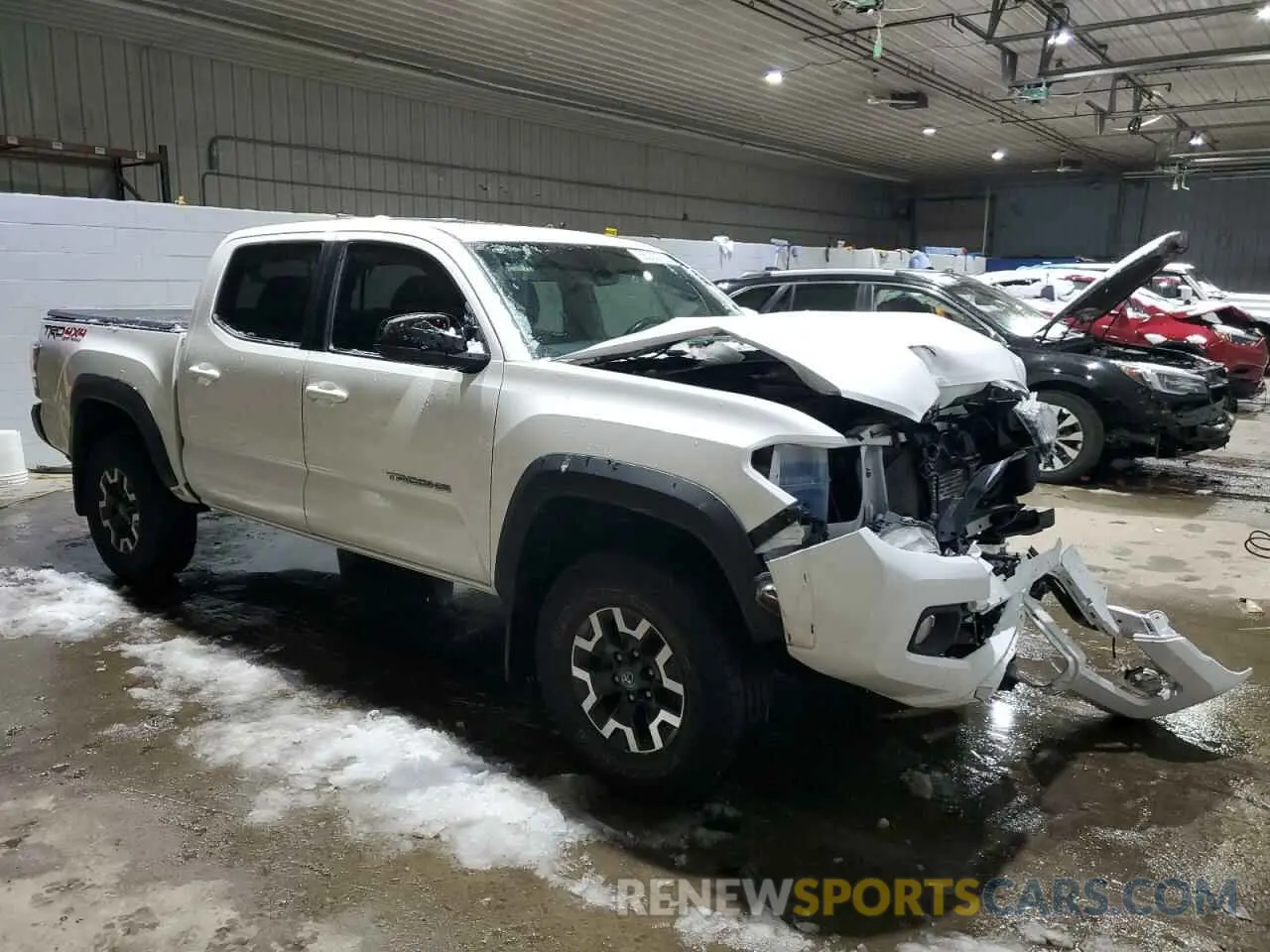 4 Photograph of a damaged car 3TMCZ5AN5LM325643 TOYOTA TACOMA 2020