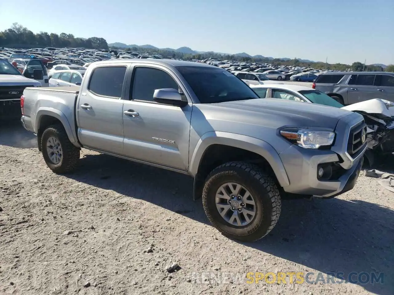 4 Photograph of a damaged car 3TMCZ5AN7LM355064 TOYOTA TACOMA 2020
