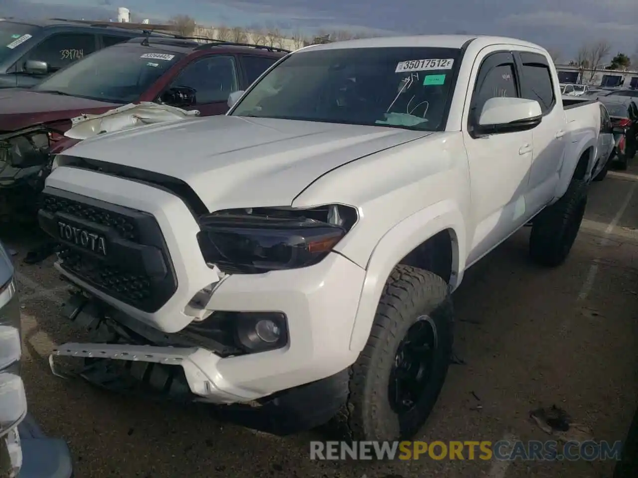 2 Photograph of a damaged car 3TMCZ5AN8LM313194 TOYOTA TACOMA 2020