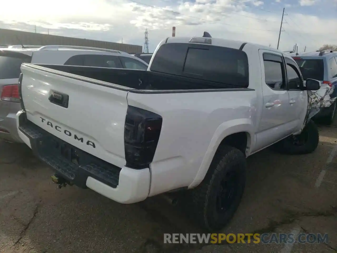 4 Photograph of a damaged car 3TMCZ5AN8LM313194 TOYOTA TACOMA 2020