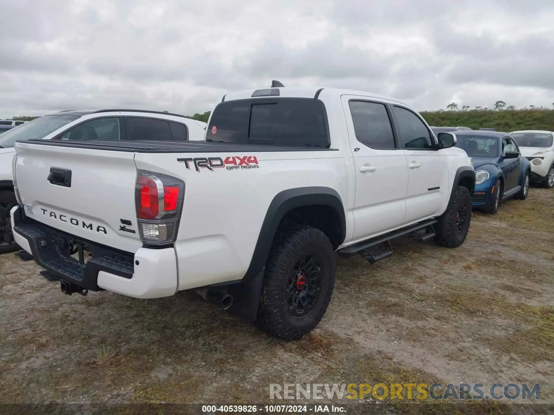 4 Photograph of a damaged car 3TMCZ5AN9LM321644 TOYOTA TACOMA 2020