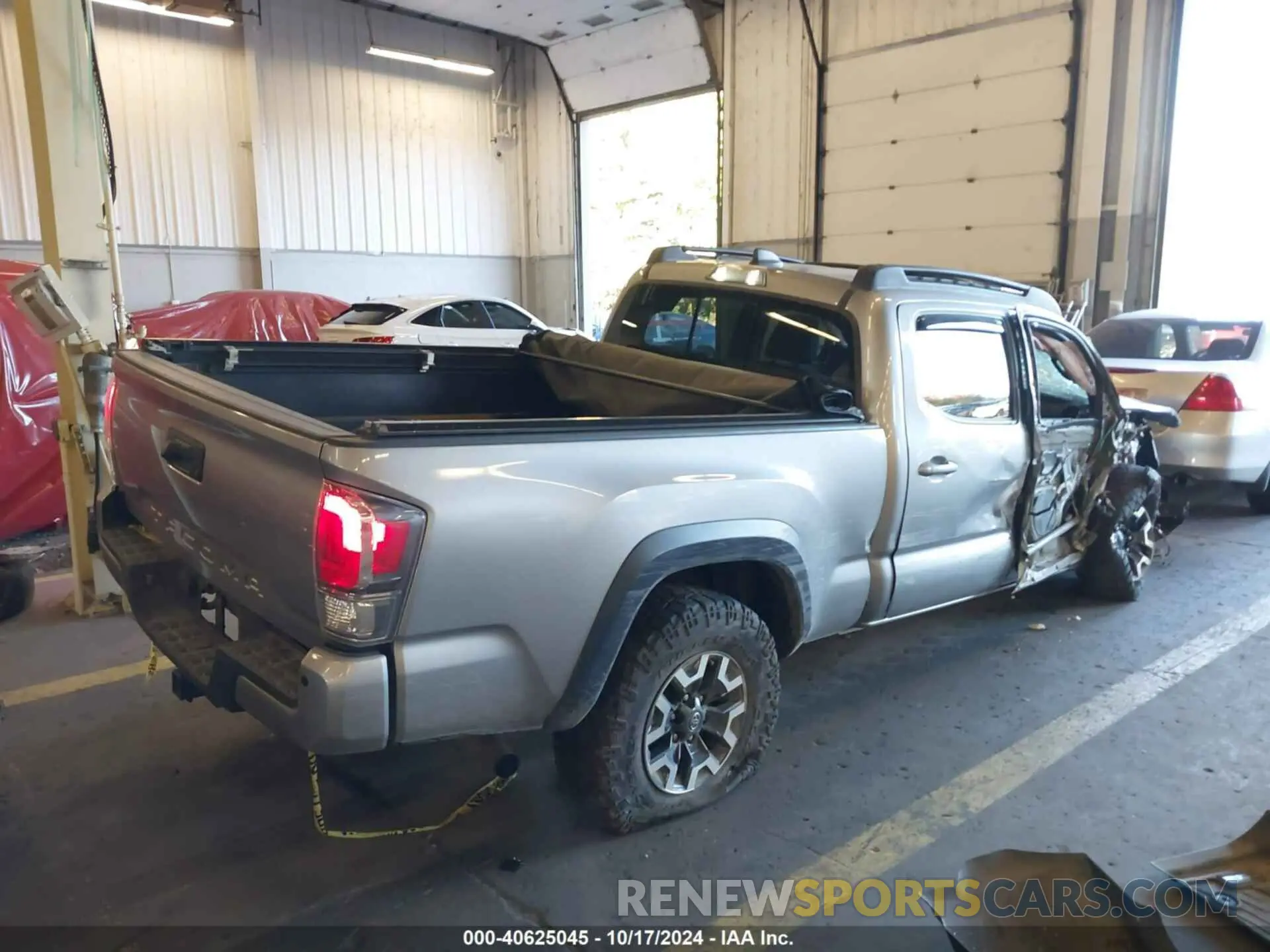 4 Photograph of a damaged car 3TMDZ5BN6LM080144 TOYOTA TACOMA 2020