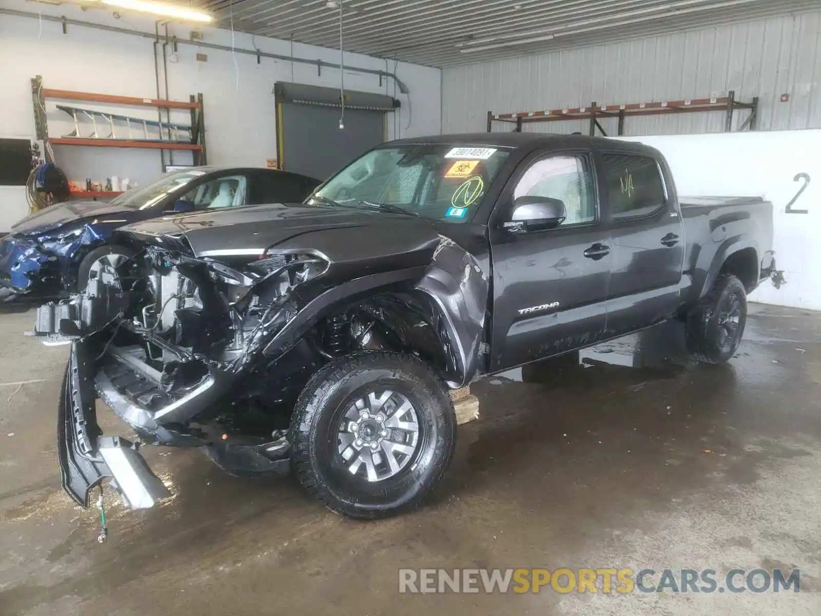 2 Photograph of a damaged car 3TMDZ5BN6LM083089 TOYOTA TACOMA 2020