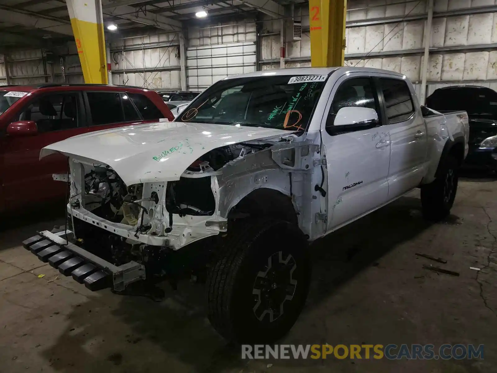 2 Photograph of a damaged car 3TMDZ5BN9LM080526 TOYOTA TACOMA 2020