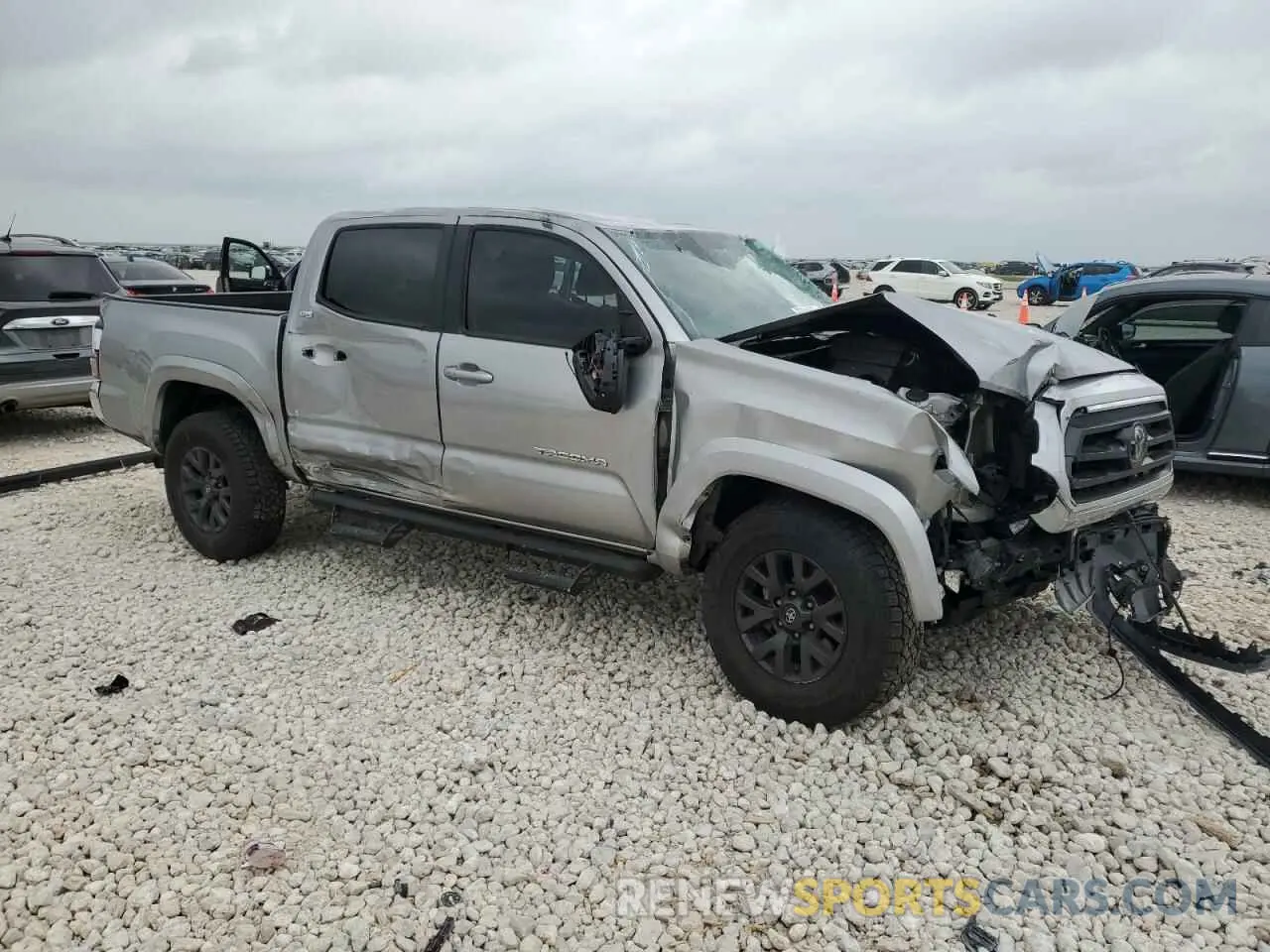 4 Photograph of a damaged car 5TFAZ5CN0LX089045 TOYOTA TACOMA 2020