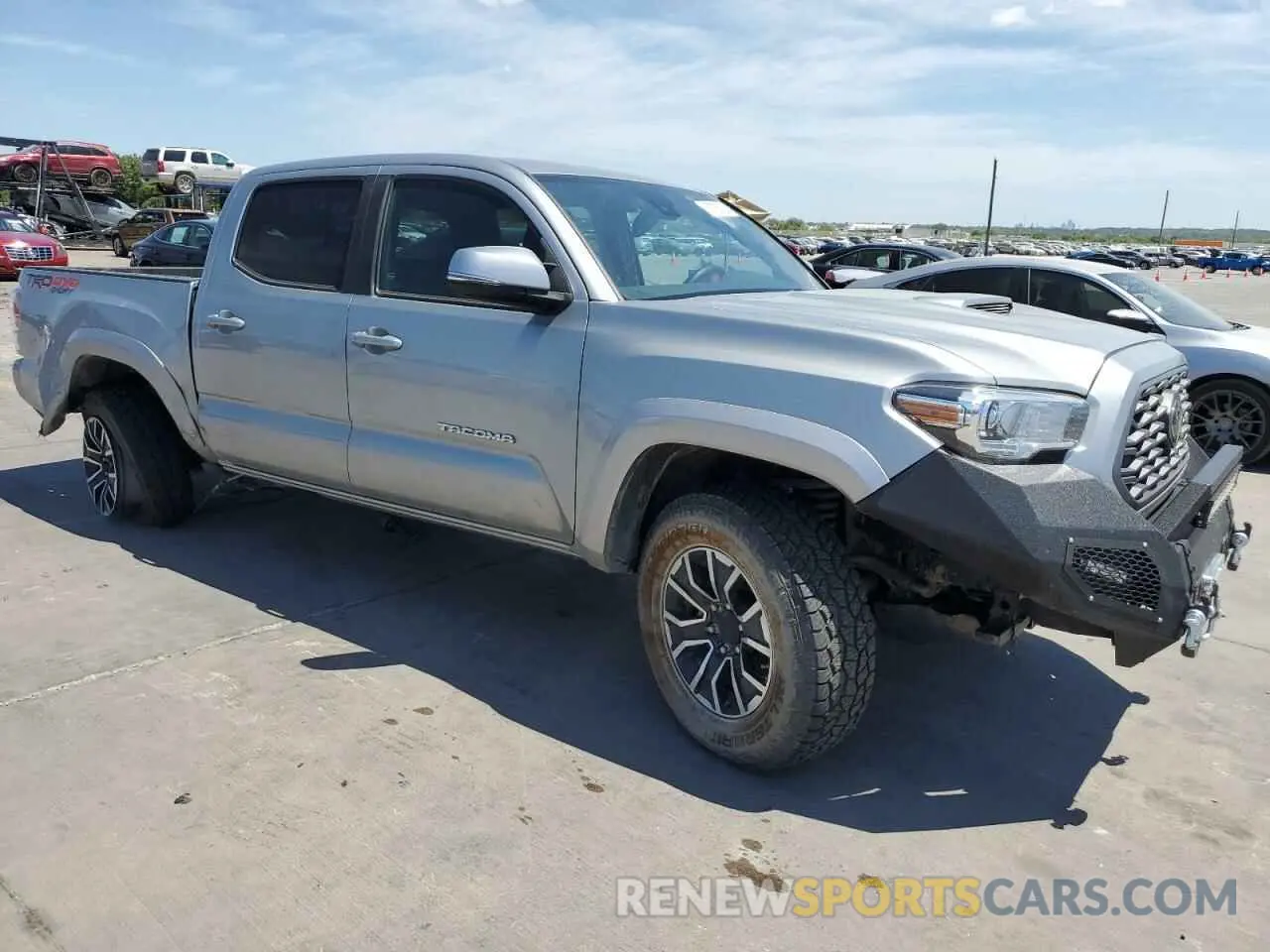4 Photograph of a damaged car 5TFCZ5AN2LX222433 TOYOTA TACOMA 2020