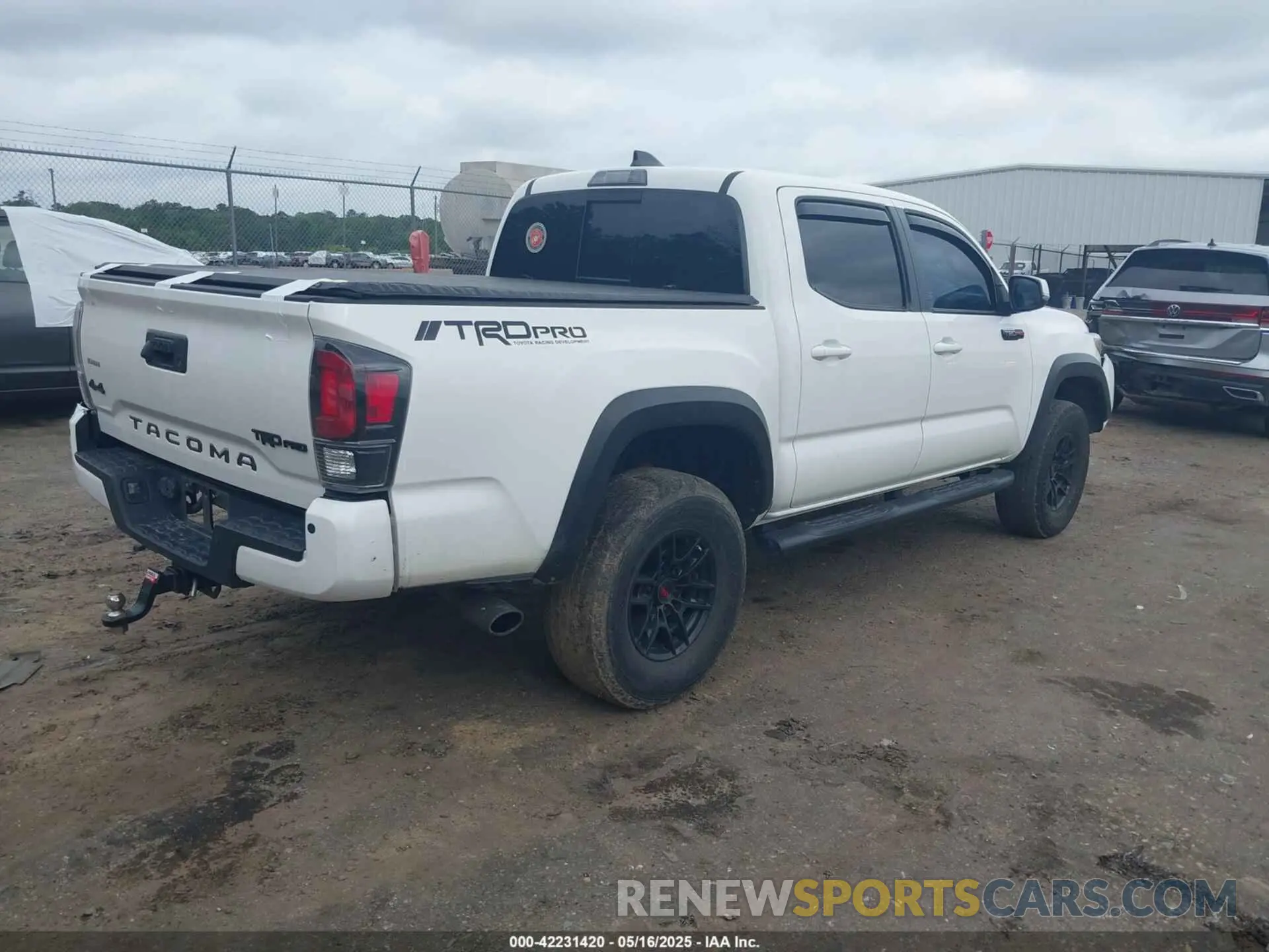 4 Photograph of a damaged car 5TFCZ5AN3LX226071 TOYOTA TACOMA 2020