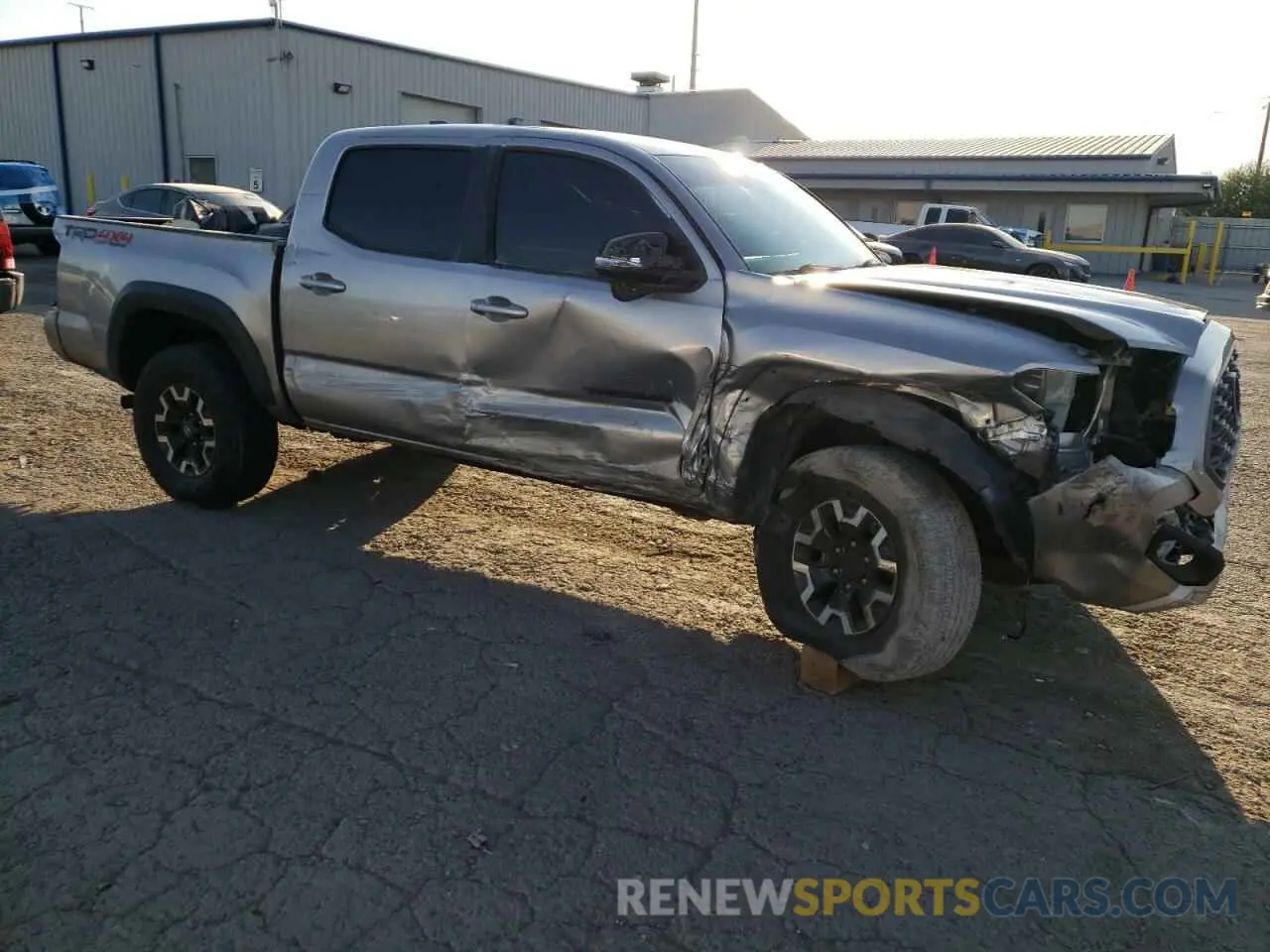 4 Photograph of a damaged car 5TFCZ5AN6LX235685 TOYOTA TACOMA 2020
