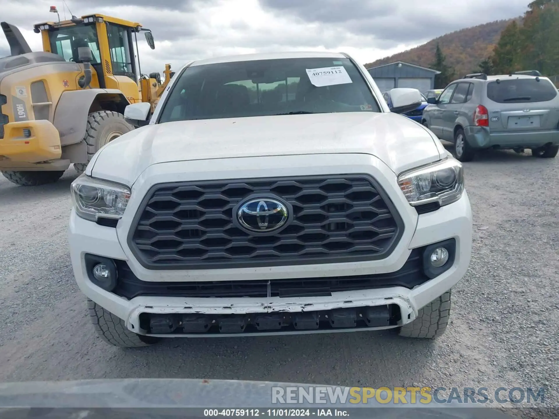 12 Photograph of a damaged car 5TFCZ5AN8LX243416 TOYOTA TACOMA 2020
