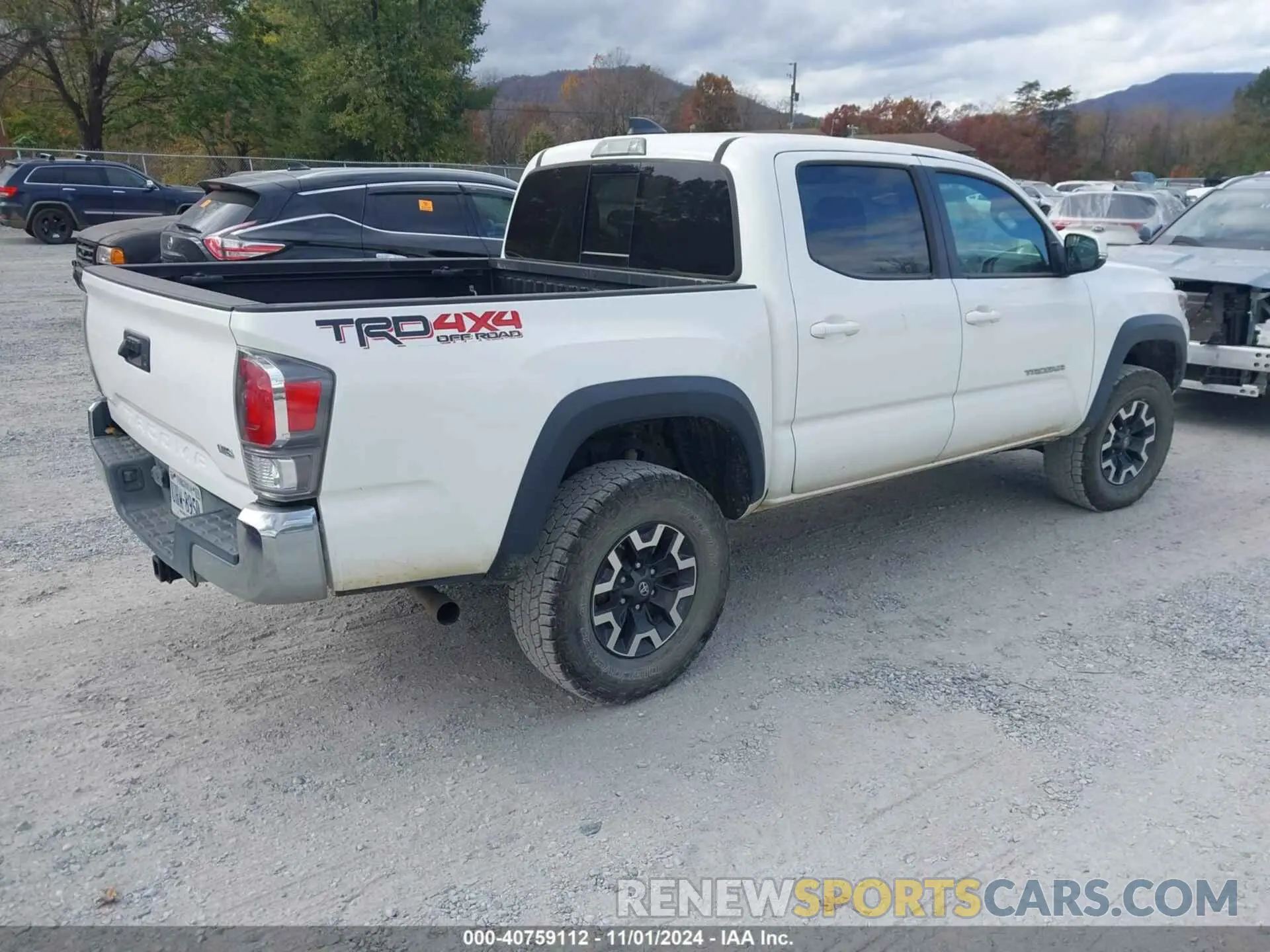 4 Photograph of a damaged car 5TFCZ5AN8LX243416 TOYOTA TACOMA 2020