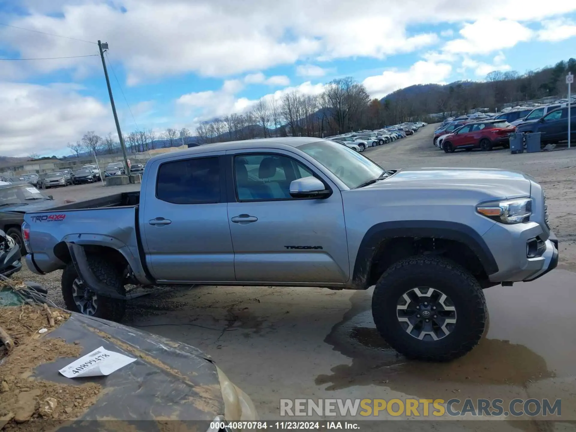 13 Photograph of a damaged car 5TFCZ5AN9LX212885 TOYOTA TACOMA 2020