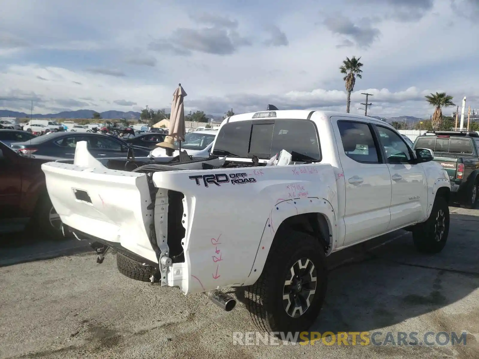 4 Photograph of a damaged car 3TMAZ5CN2MM141203 TOYOTA TACOMA 2021