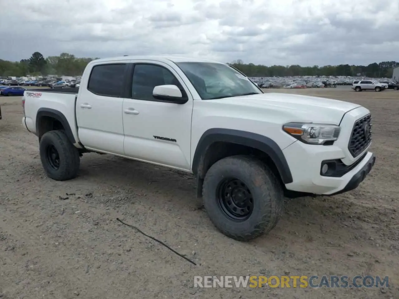 4 Photograph of a damaged car 3TMCZ5AN4MM429848 TOYOTA TACOMA 2021