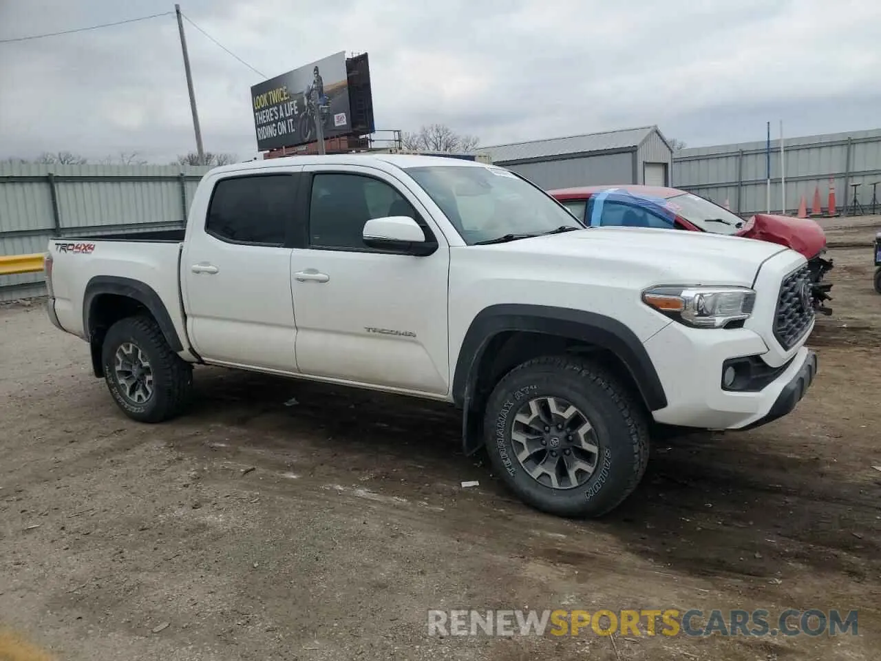 4 Photograph of a damaged car 3TMCZ5AN4MM431874 TOYOTA TACOMA 2021