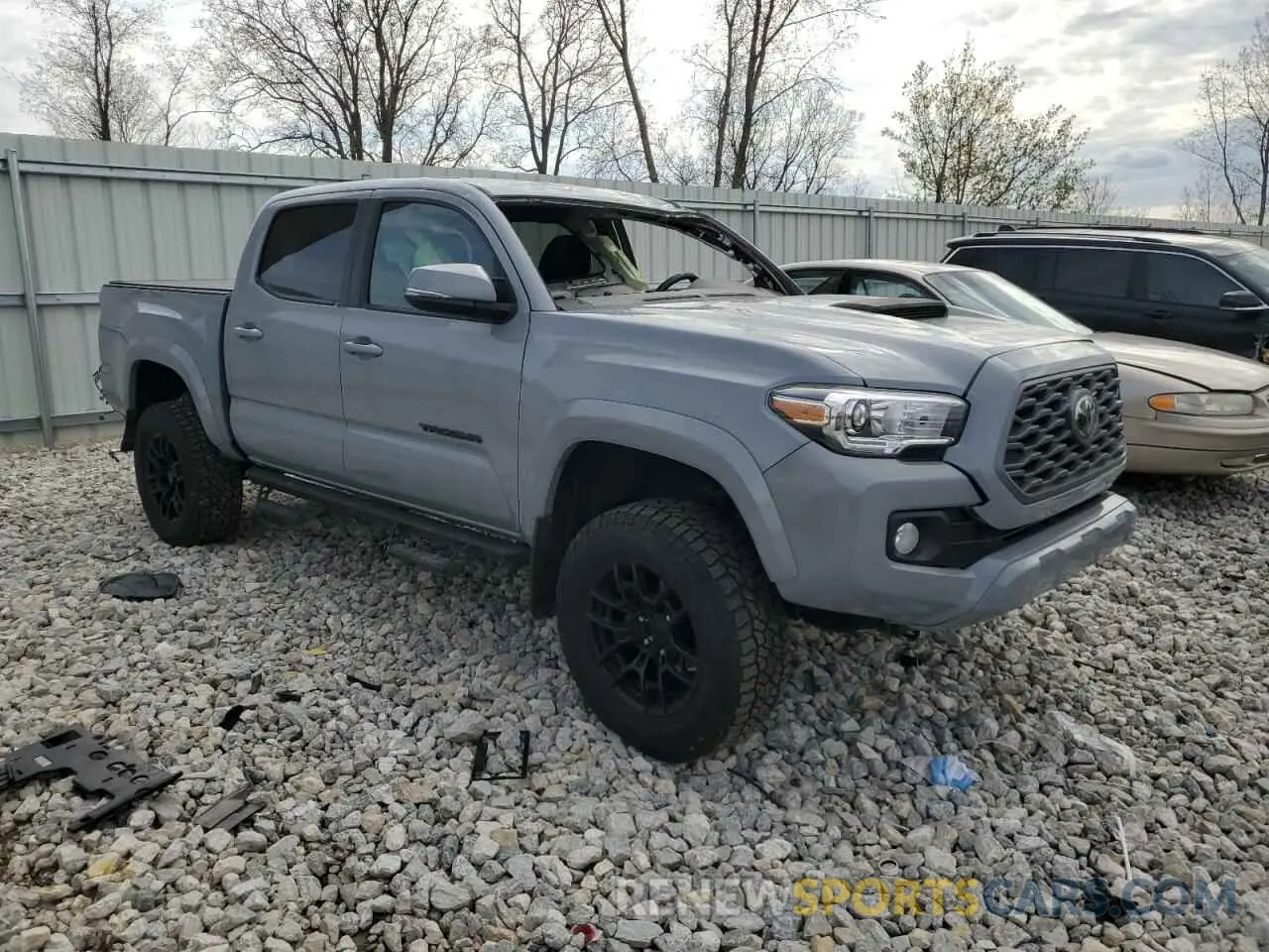4 Photograph of a damaged car 3TMCZ5AN9MM374491 TOYOTA TACOMA 2021