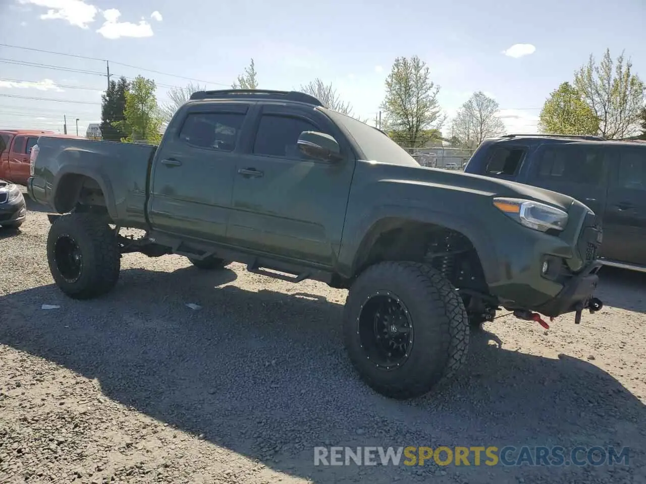 4 Photograph of a damaged car 3TMDZ5BN9MM116619 TOYOTA TACOMA 2021