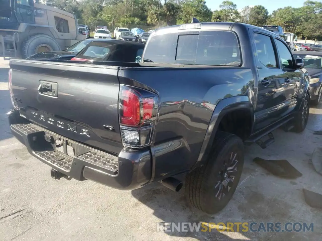4 Photograph of a damaged car 3TMGZ5AN8MM379957 TOYOTA TACOMA 2021