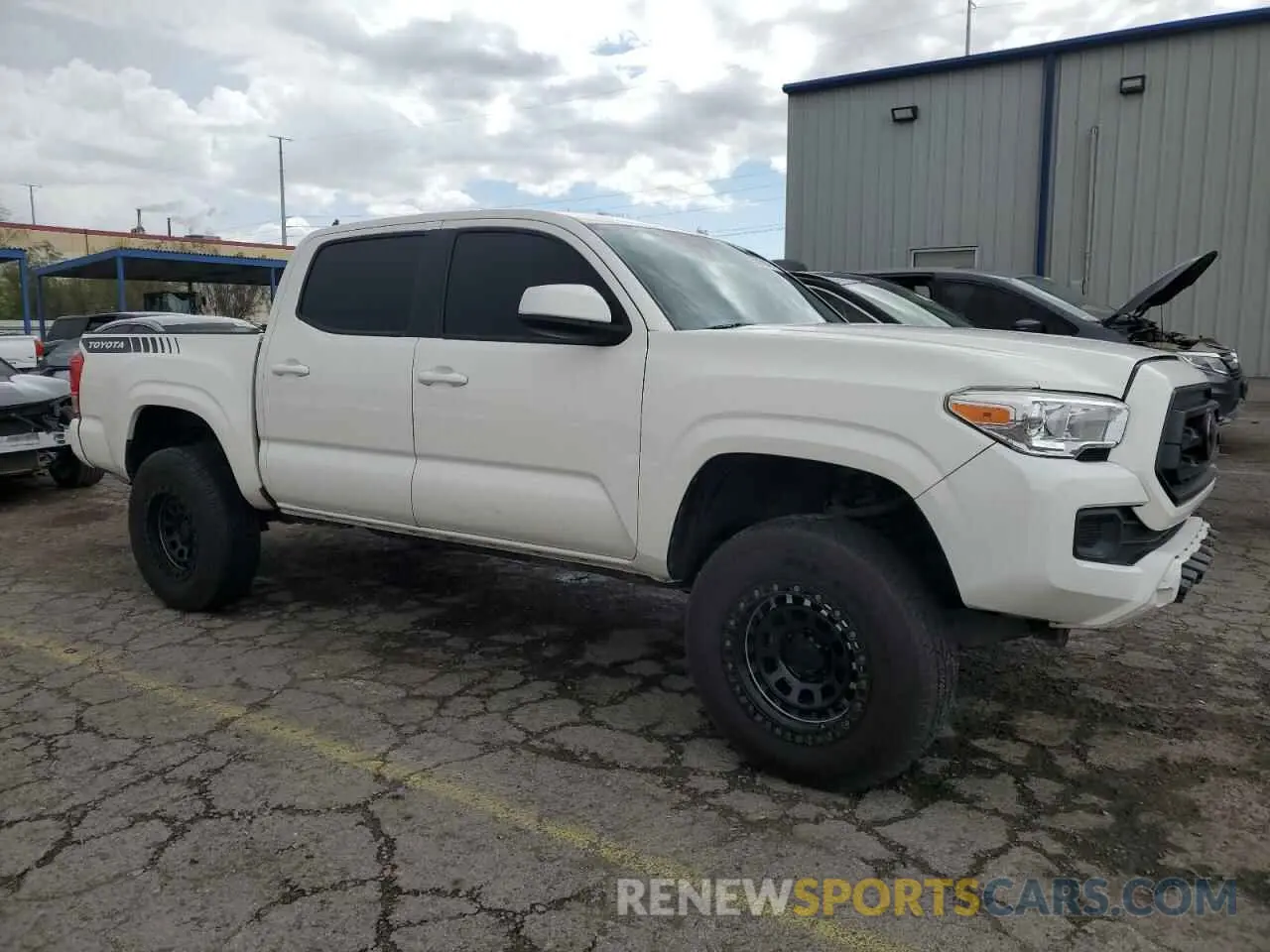4 Photograph of a damaged car 3TYAX5GN3MT011810 TOYOTA TACOMA 2021