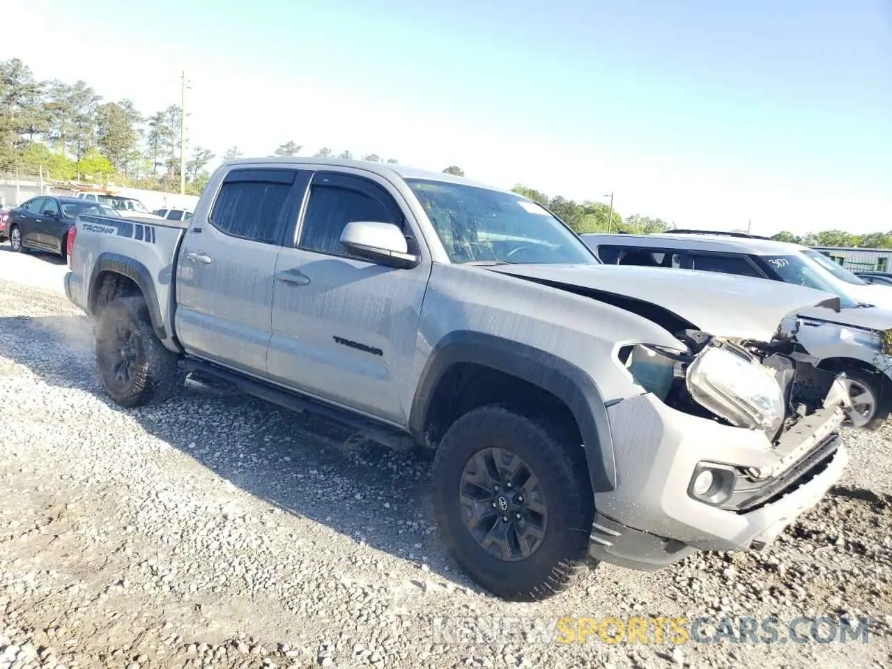 4 Photograph of a damaged car 3TYCZ5AN2MT027654 TOYOTA TACOMA 2021