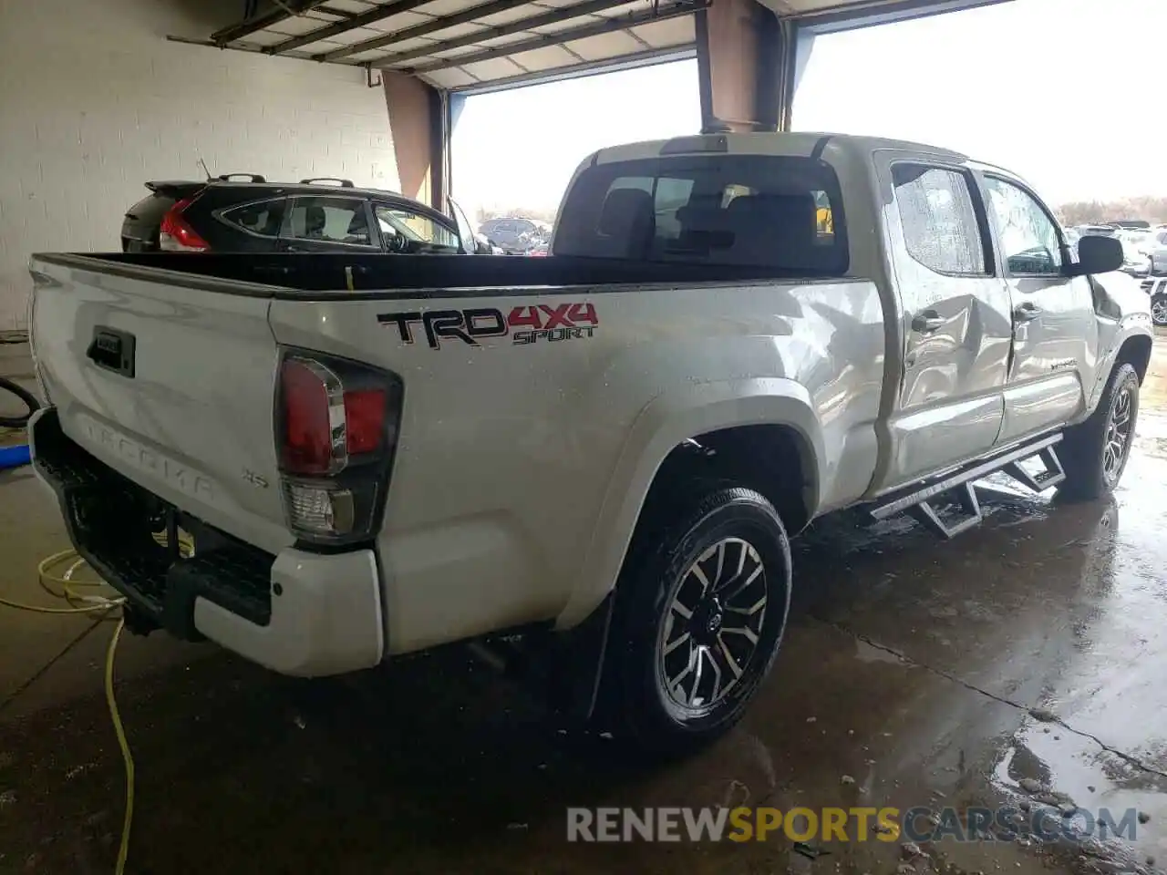 4 Photograph of a damaged car 3TYDZ5BN3MT003026 TOYOTA TACOMA 2021