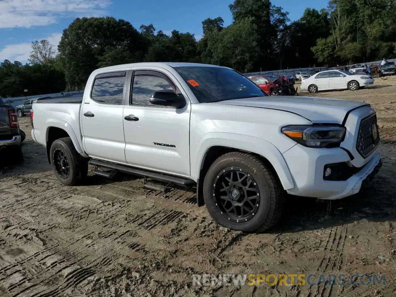 4 Photograph of a damaged car 3TYGZ5AN6MT011832 TOYOTA TACOMA 2021