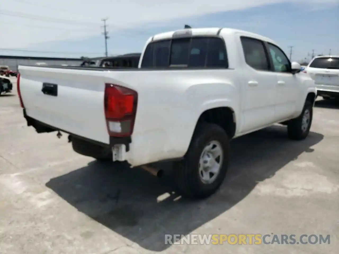 4 Photograph of a damaged car 5TFAX5GN0MX191351 TOYOTA TACOMA 2021