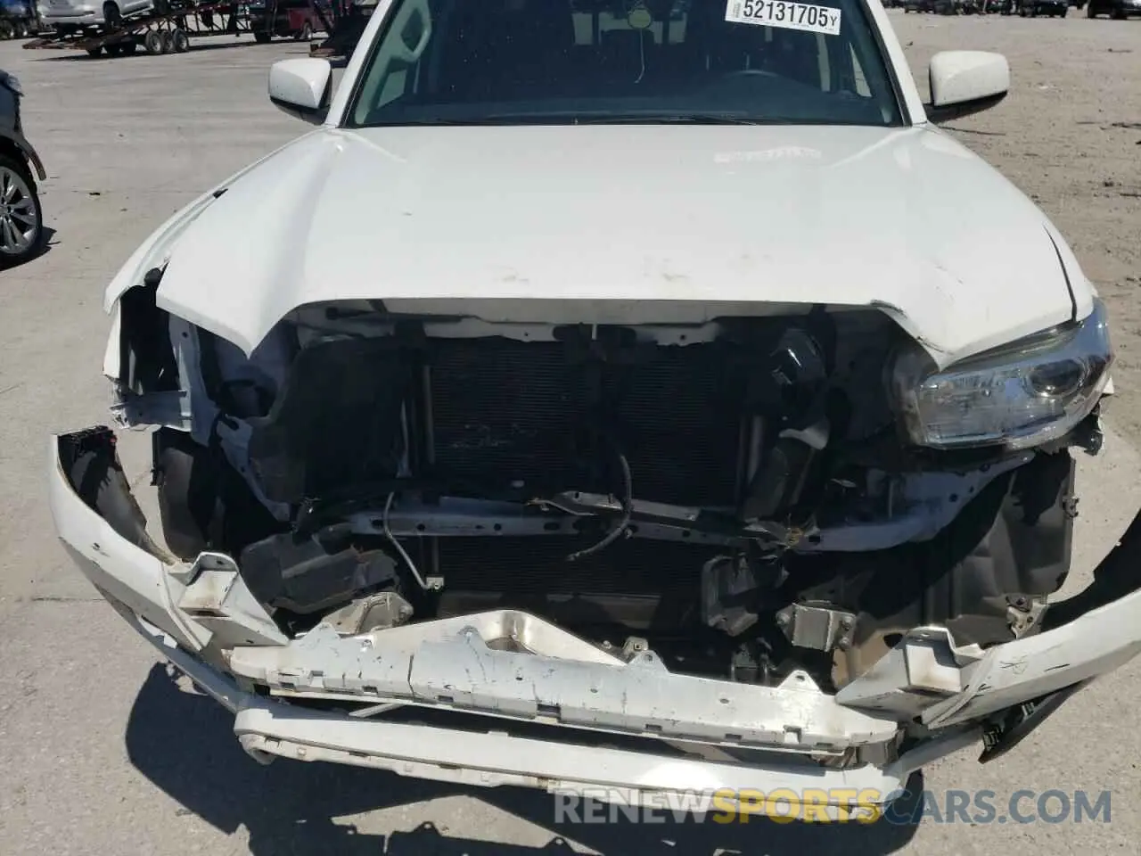 11 Photograph of a damaged car 5TFAX5GN3MX193630 TOYOTA TACOMA 2021