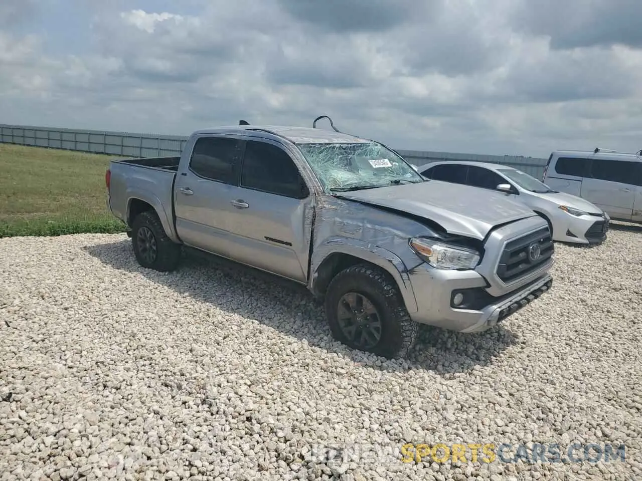 4 Photograph of a damaged car 5TFAX5GN5MX192513 TOYOTA TACOMA 2021