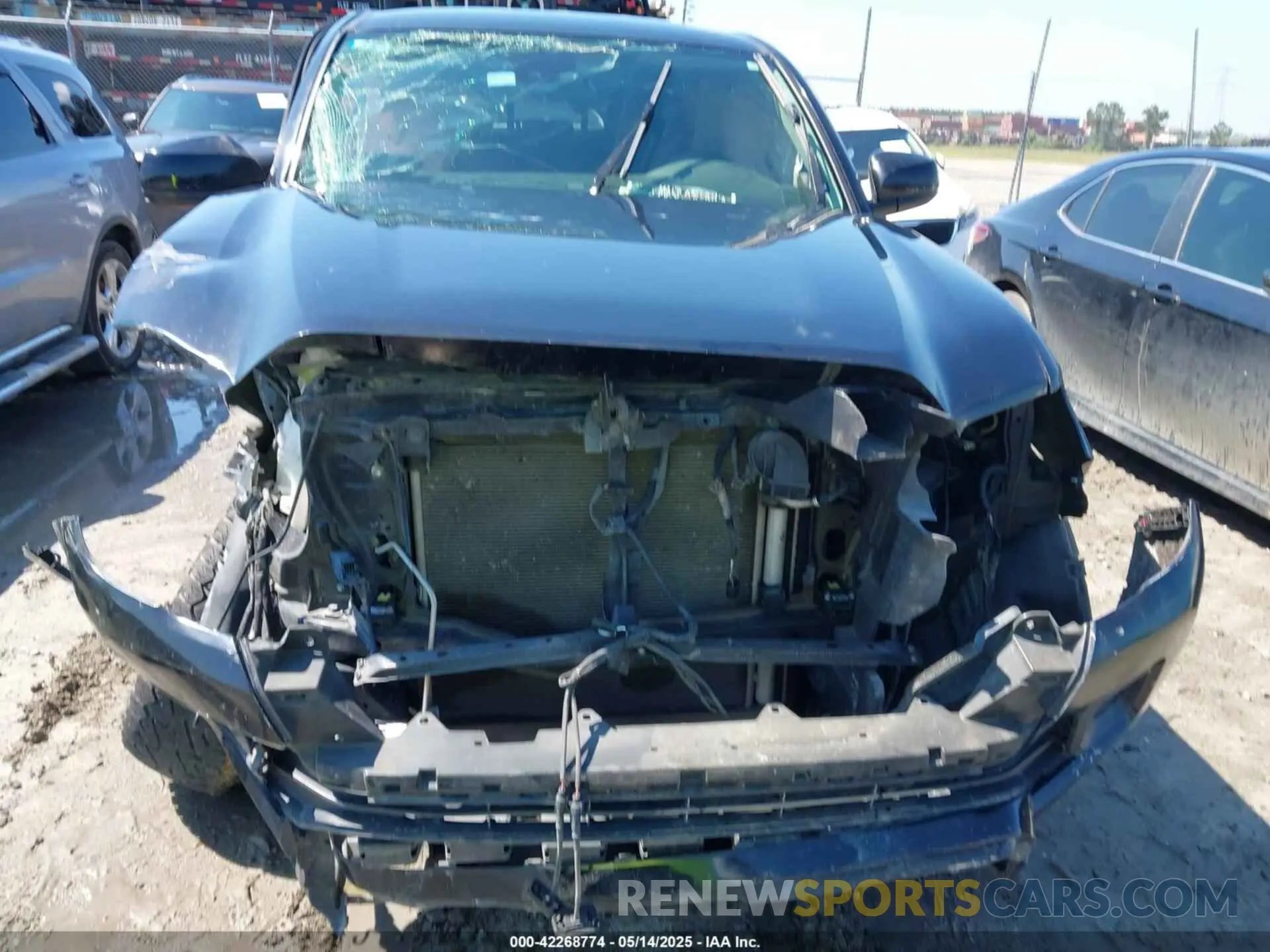 12 Photograph of a damaged car 5TFAX5GN8MX190397 TOYOTA TACOMA 2021