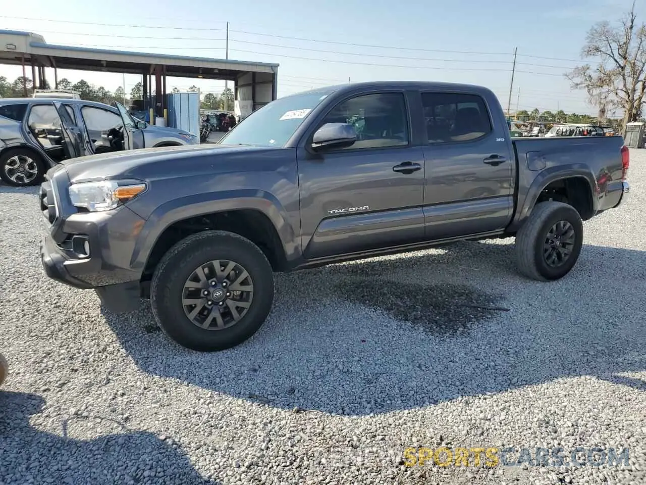 1 Photograph of a damaged car 5TFAZ5CN1MX098192 TOYOTA TACOMA 2021
