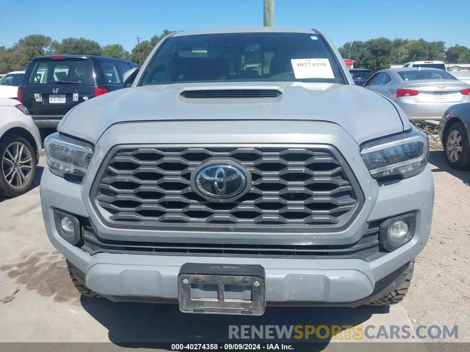 12 Photograph of a damaged car 5TFAZ5CN1MX107506 TOYOTA TACOMA 2021