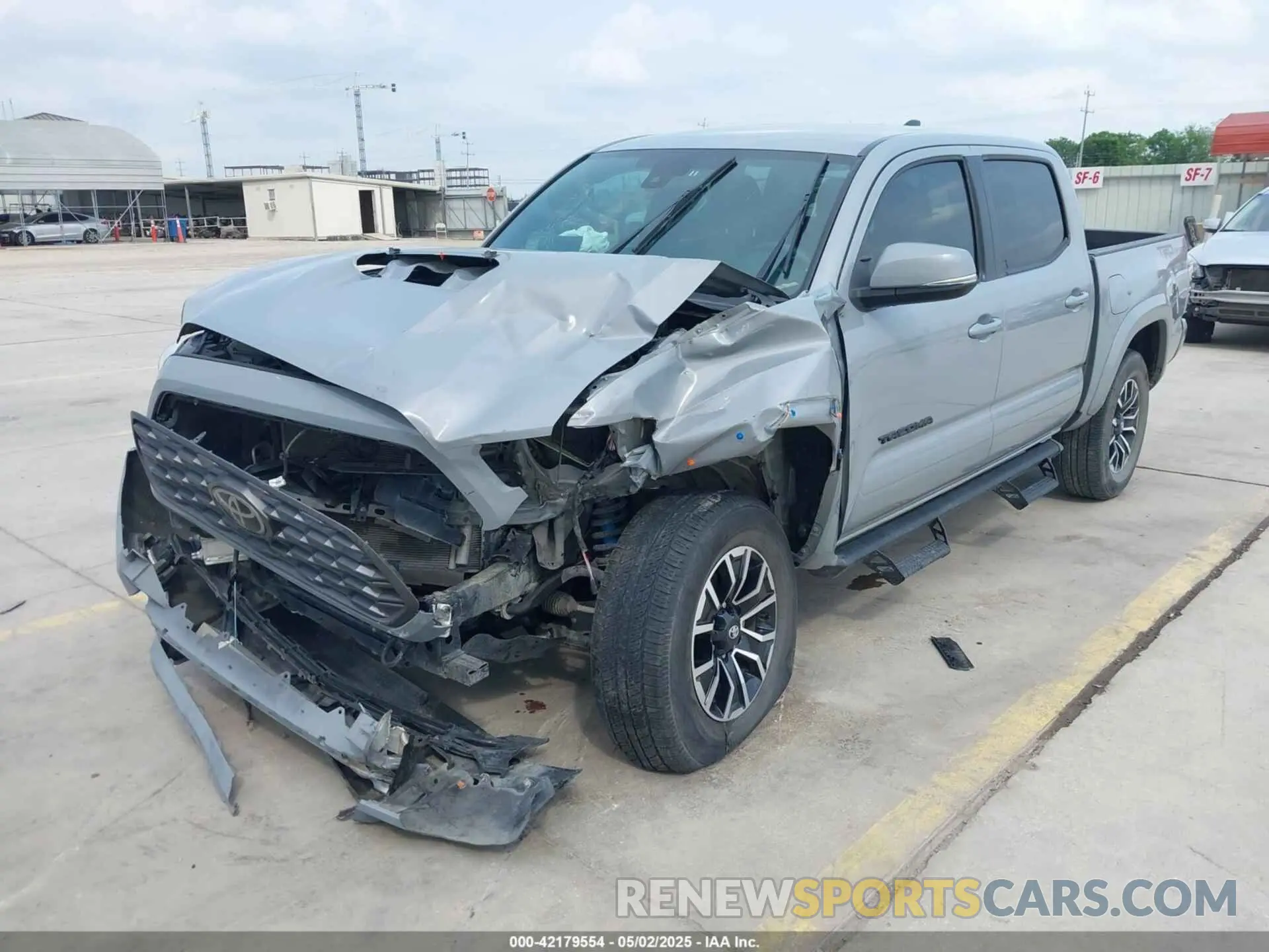 2 Photograph of a damaged car 5TFAZ5CN1MX112477 TOYOTA TACOMA 2021