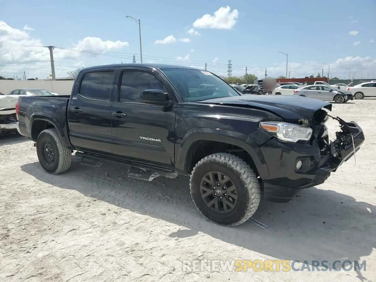 4 Photograph of a damaged car 5TFAZ5CN2MX100662 TOYOTA TACOMA 2021