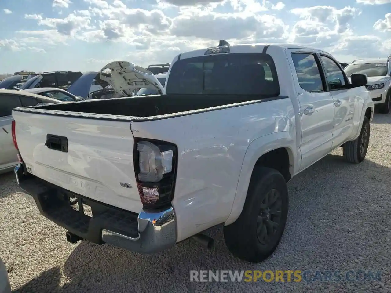 4 Photograph of a damaged car 5TFAZ5CN3MX095875 TOYOTA TACOMA 2021