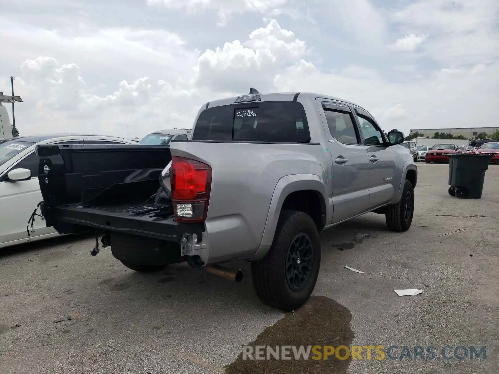 4 Photograph of a damaged car 5TFAZ5CN3MX103683 TOYOTA TACOMA 2021