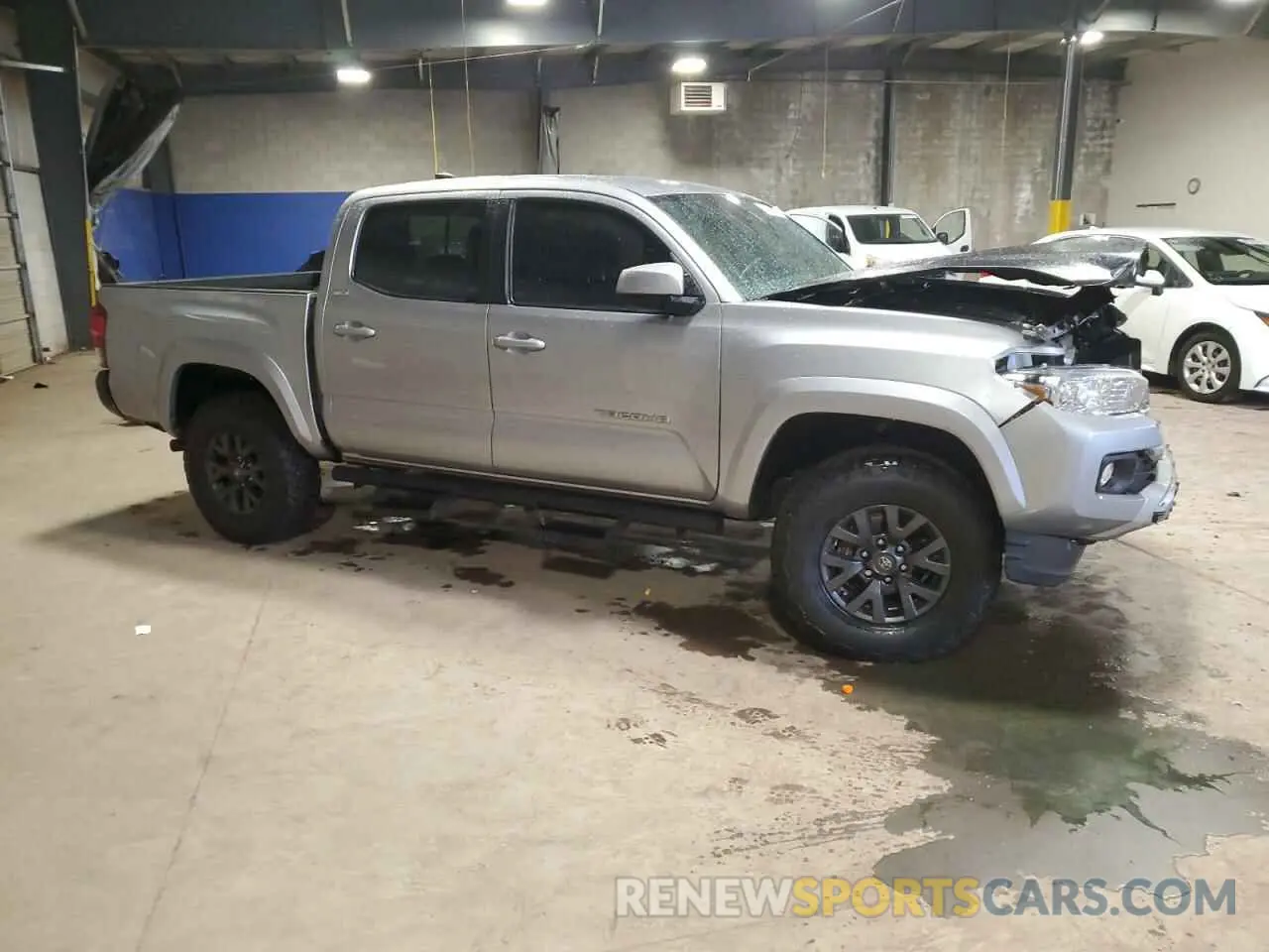 4 Photograph of a damaged car 5TFAZ5CN3MX107586 TOYOTA TACOMA 2021
