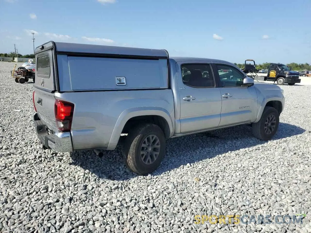 3 Photograph of a damaged car 5TFAZ5CN3MX118524 TOYOTA TACOMA 2021