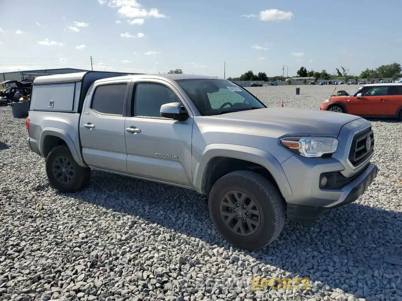 4 Photograph of a damaged car 5TFAZ5CN3MX118524 TOYOTA TACOMA 2021