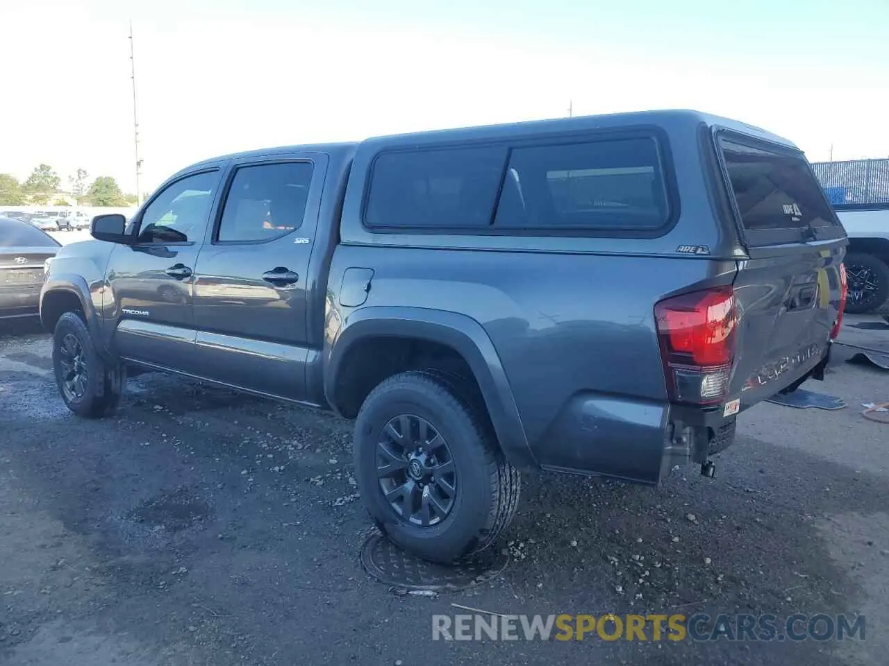 2 Photograph of a damaged car 5TFAZ5CN4MX105040 TOYOTA TACOMA 2021