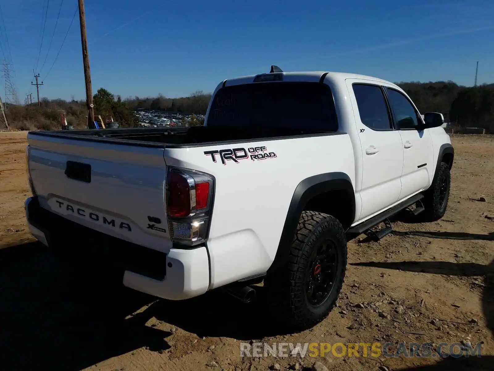 4 Photograph of a damaged car 5TFAZ5CN5MX099300 TOYOTA TACOMA 2021