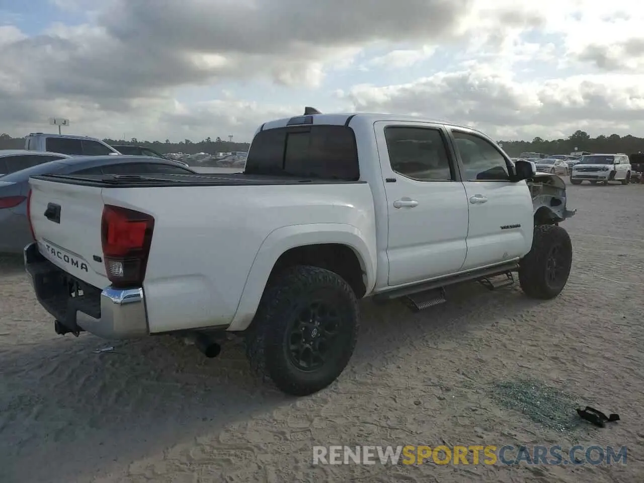 3 Photograph of a damaged car 5TFAZ5CN5MX107928 TOYOTA TACOMA 2021