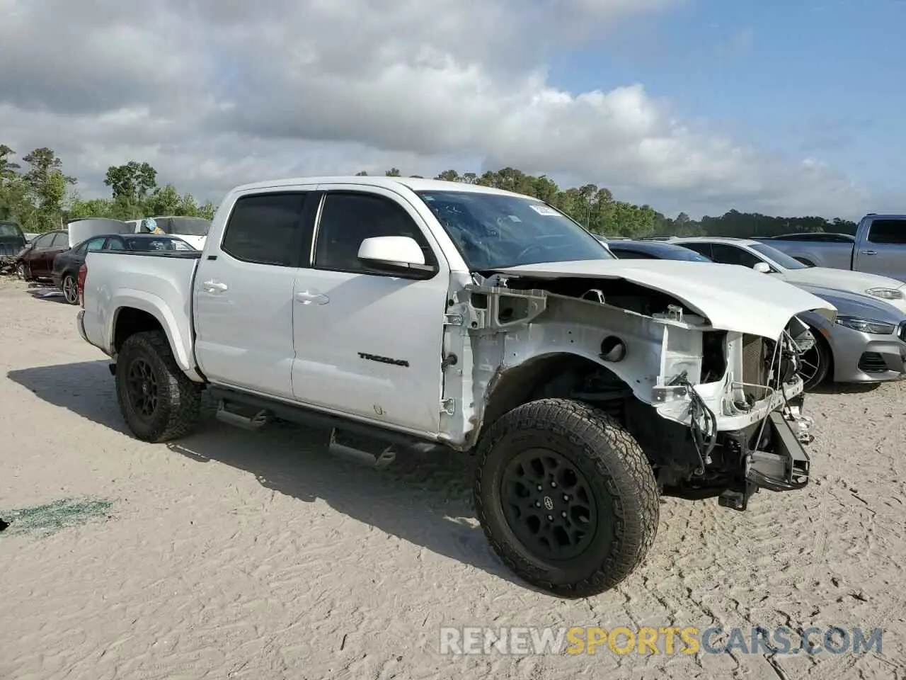 4 Photograph of a damaged car 5TFAZ5CN5MX107928 TOYOTA TACOMA 2021