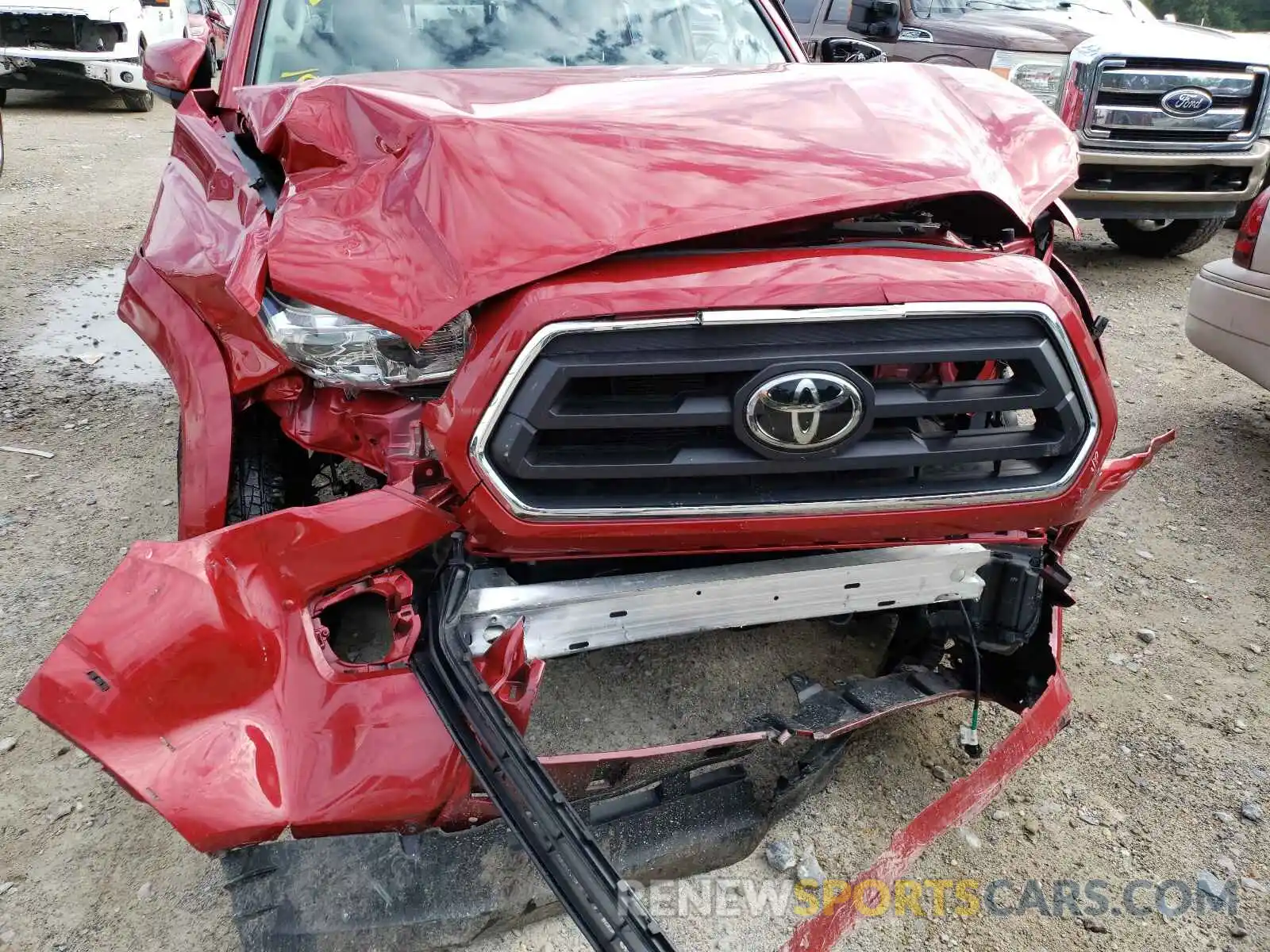 9 Photograph of a damaged car 5TFAZ5CN6MX097328 TOYOTA TACOMA 2021