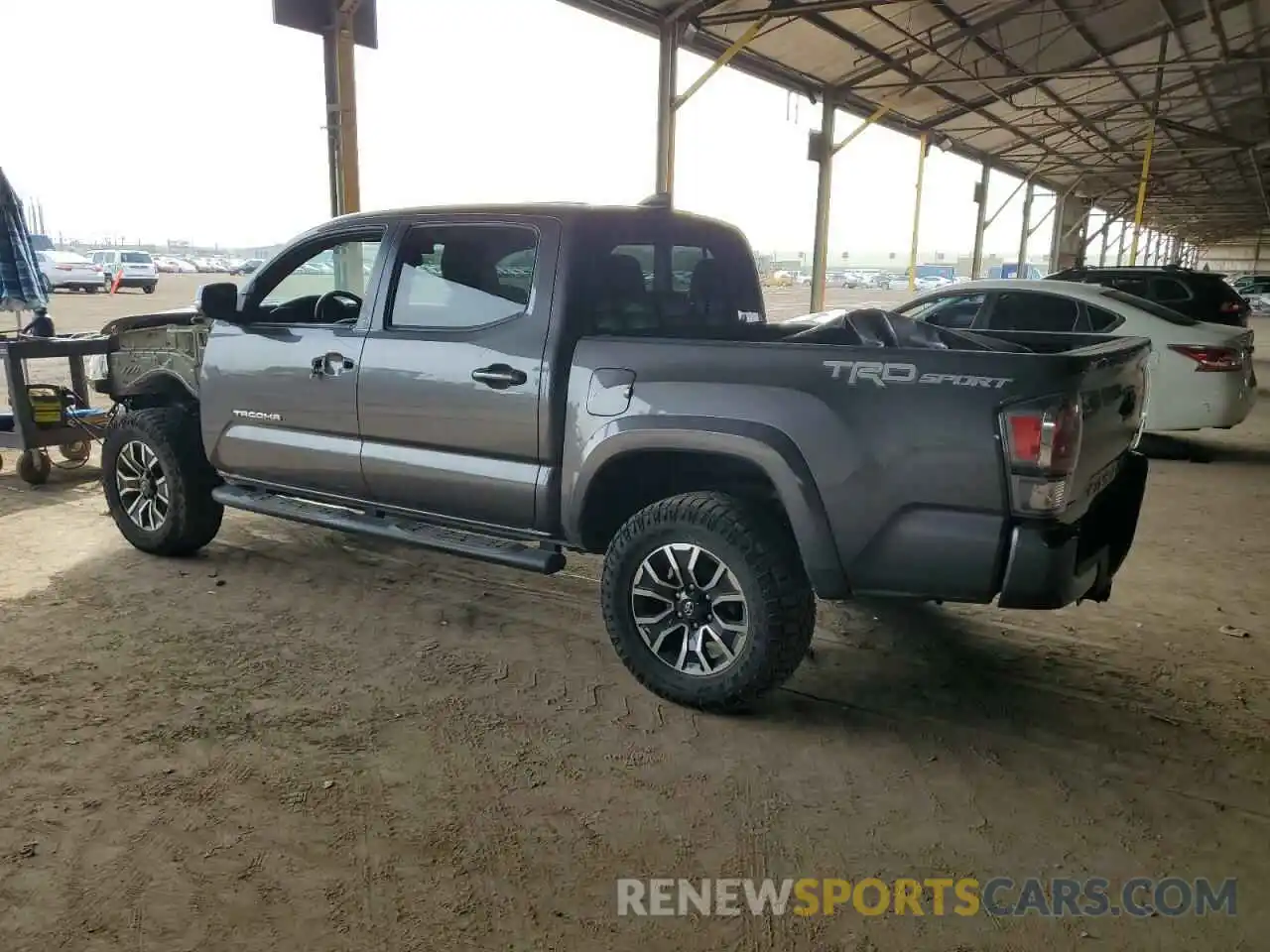 2 Photograph of a damaged car 5TFAZ5CN6MX099564 TOYOTA TACOMA 2021