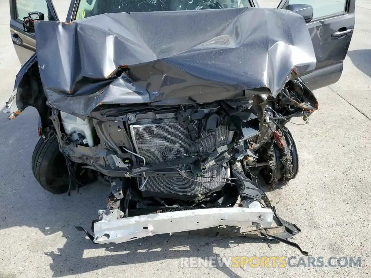 7 Photograph of a damaged car 5TFAZ5CN7MX105467 TOYOTA TACOMA 2021