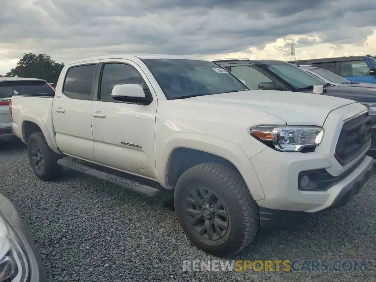 4 Photograph of a damaged car 5TFAZ5CN7MX107302 TOYOTA TACOMA 2021